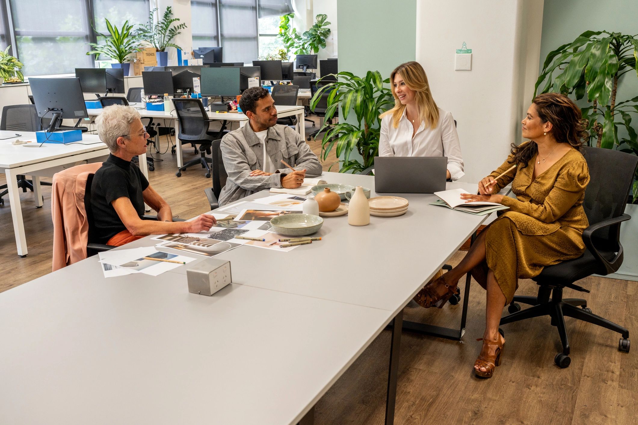 JXA Advertising team collaborating in a creative agency meeting